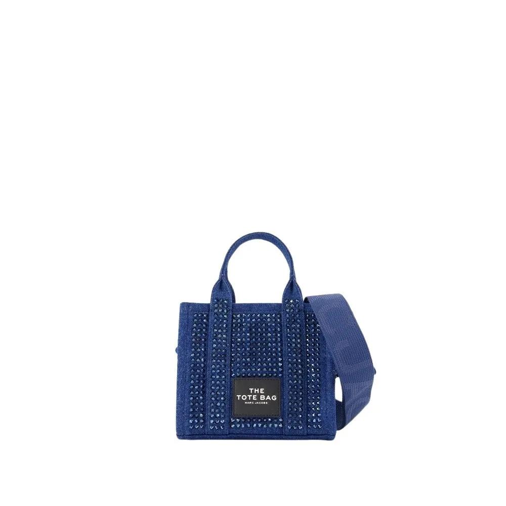 Marc Jacobs Crossbody bags - The Crossbody Tote Denim Crystal Dark Wash Blue in blauw