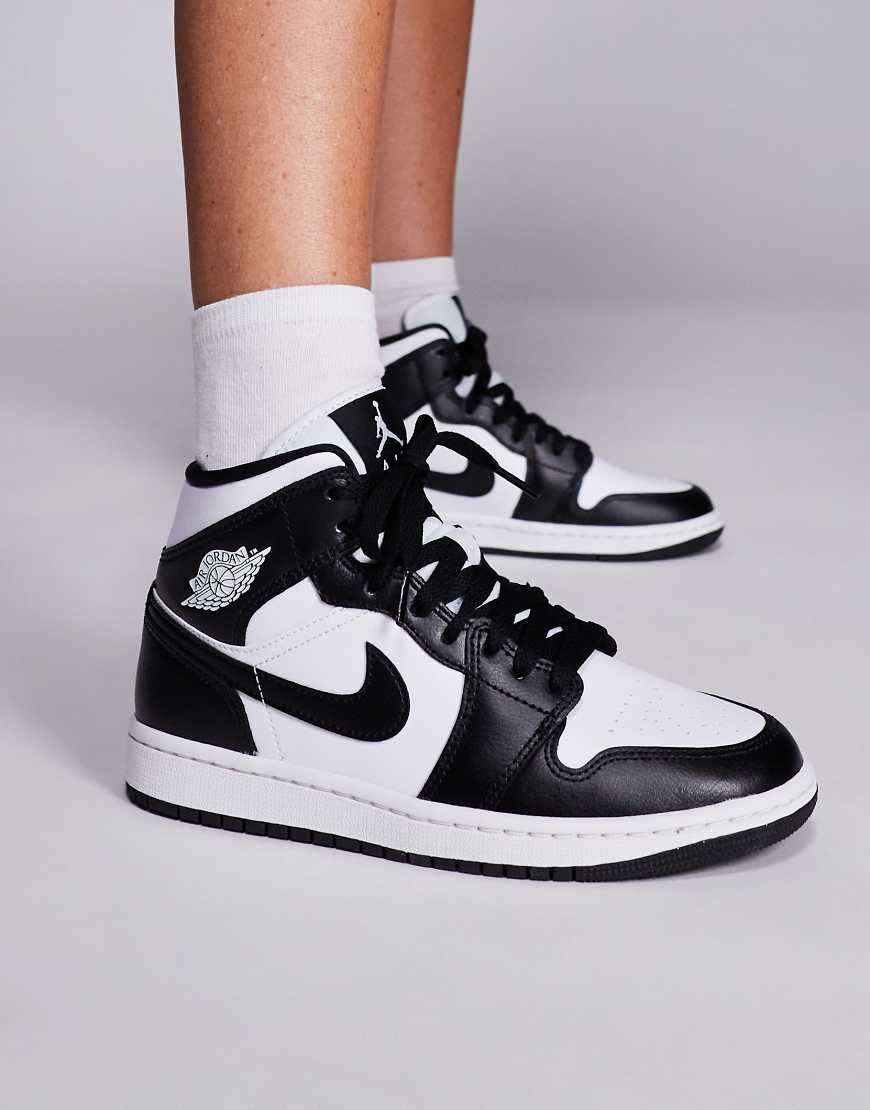Nike - Air Jordan 1 Mid - Sneaker in Weiß und Schwarz