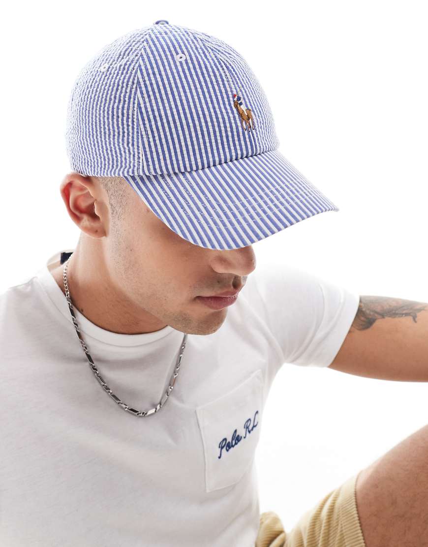 Polo Ralph Lauren - Mehrfarbig gestreifte Seersucker-Baseballkappe in Mittelblau mit Markenlogo