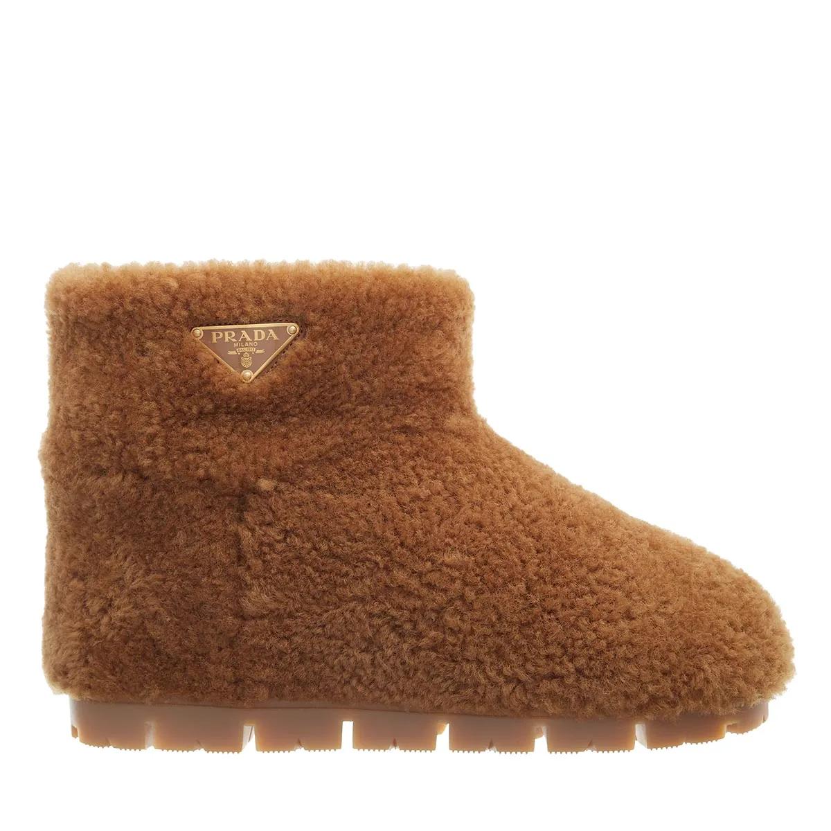 Prada Enkellaarzen - Boots with Shearling in bruin