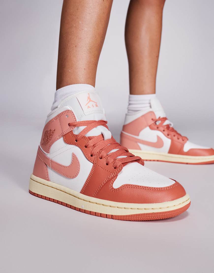 Nike - Air Jordan 1 Mid - Sneaker in Orange und Rosa-Weiß