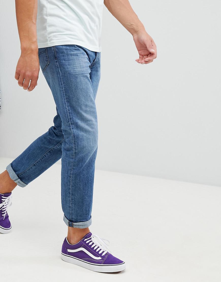 Diesel - Mharky - Schmale Jeans im Stil der 90er-Jahre in dunkler 0076M-Waschung-Blau