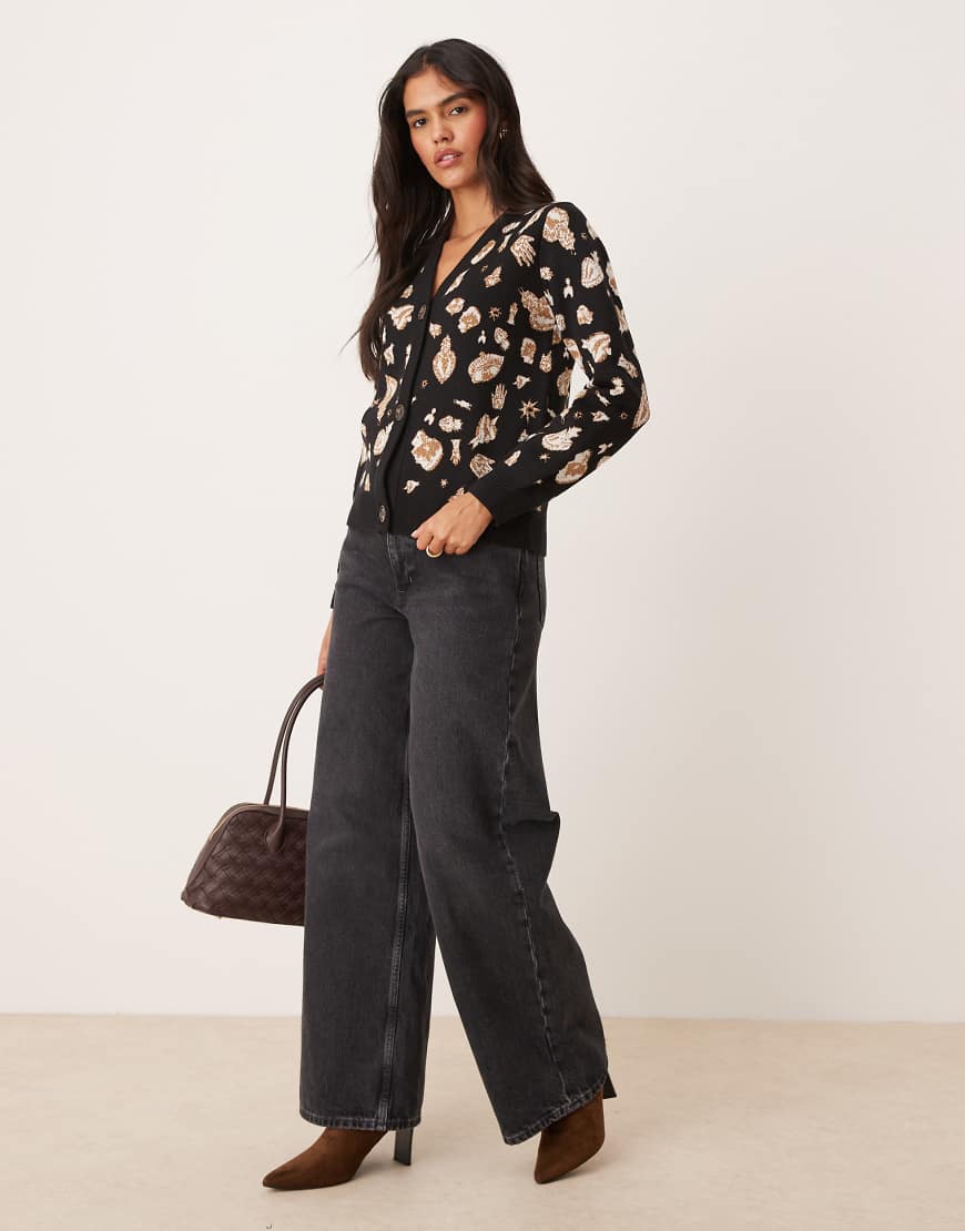 Never Fully Dressed - Oversize-Strickjacke aus Jacquard in Schwarz und Gold