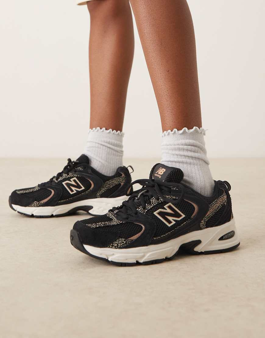 New Balance - 530 - Sneaker in Schwarz mit Leopardenmuster-Detail