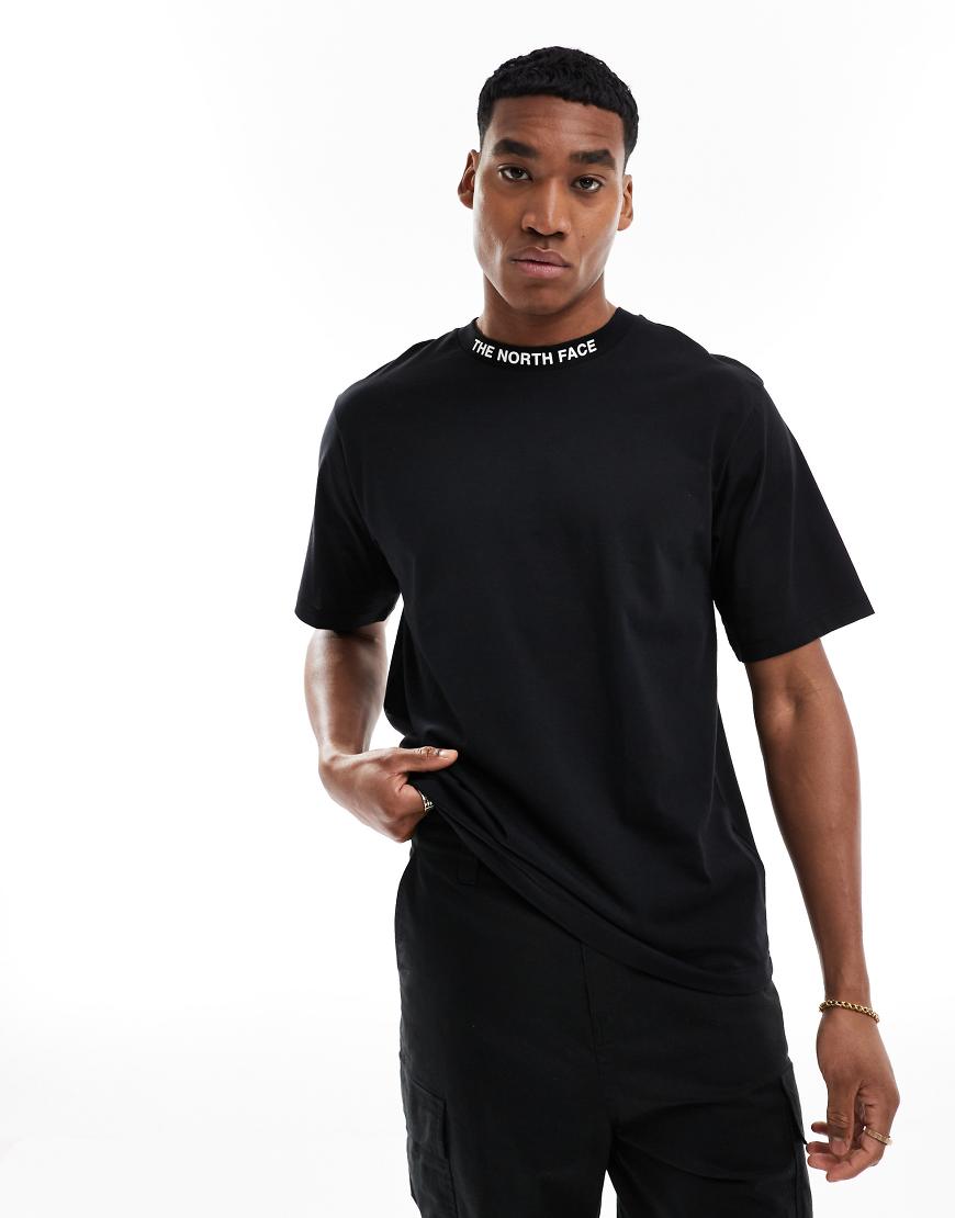 The North Face - Zumu - T-Shirt in Schwarz mit Logostreifen