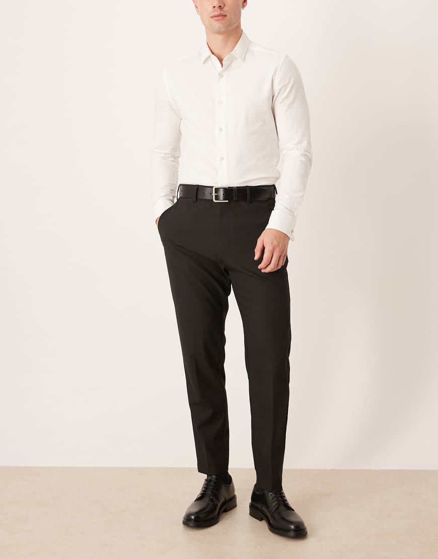 ASOS DESIGN - Elegante, schmal zulaufende Hose in Schwarz