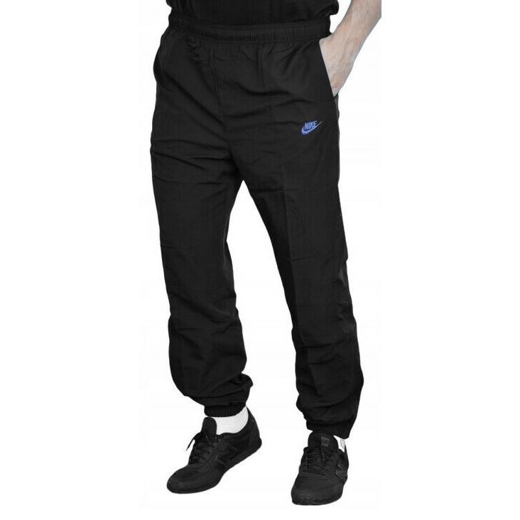 Nike Lichtgewicht geweven trainingsbroek voor heren, zwart/blauw - maat M