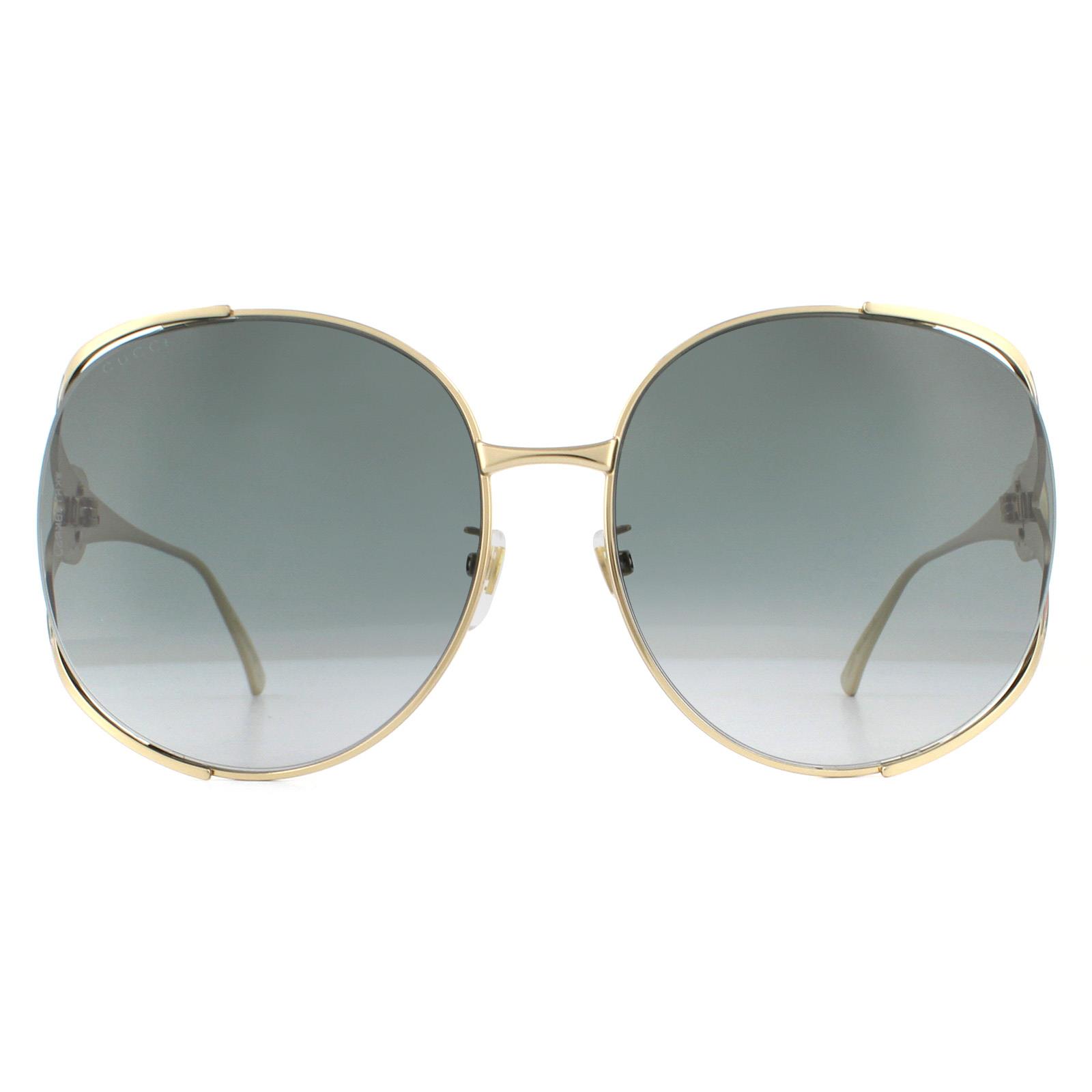 Gucci Zonnebril GG0225S 001 Goudgrijs Verloop