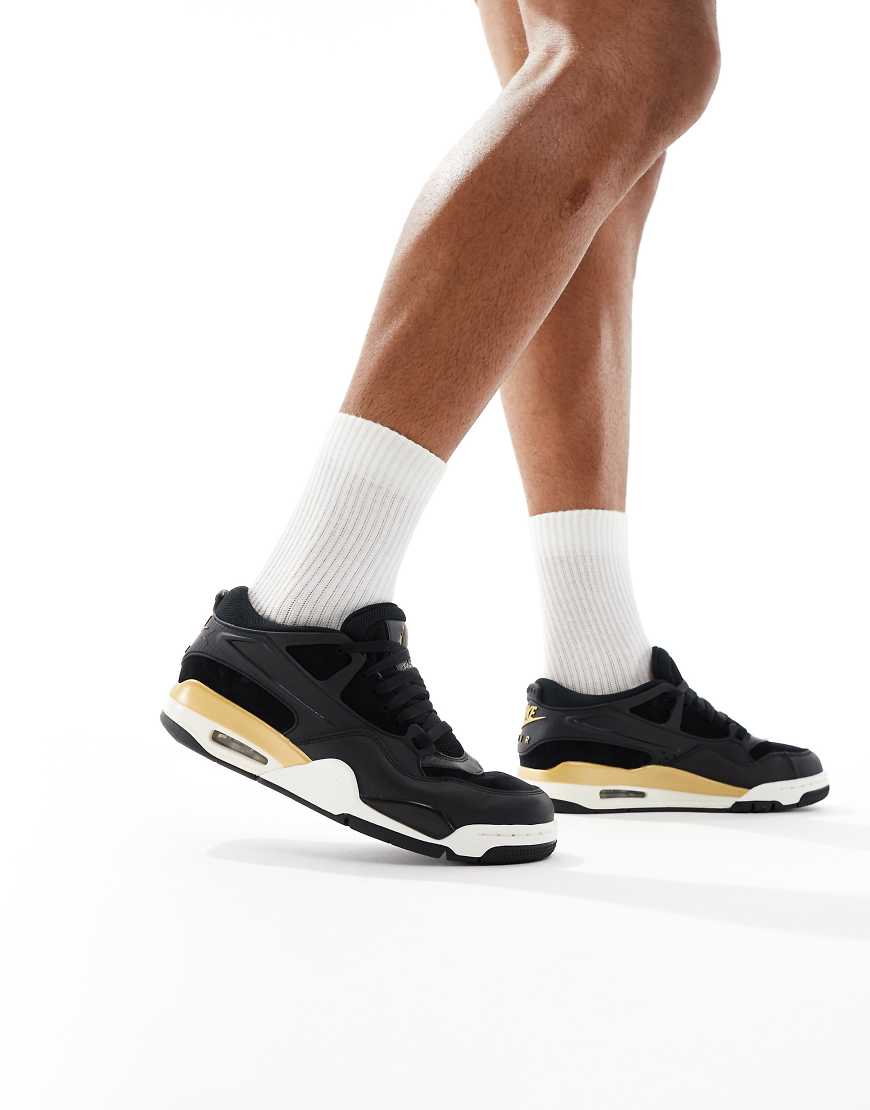 Nike - Air Jordan 4 RM - Sneaker in Schwarz und Gold